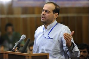 Mahafarid Amir Khosravi speaks at his trial in this 2012 file photo.