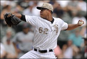 Chicago White Sox starter Jose Quintana delivers a pitch during the first inning.