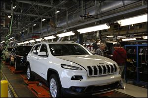 The line of fully assembled Jeep Cherokees.