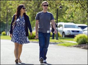 Mark Zuckerberg, president and CEO of Facebook, and his wife Priscilla Chan.
