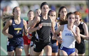 Courtney Clody of Perrysburg wins the 1600 meter run during the Division I Regional Track & Field Championships.