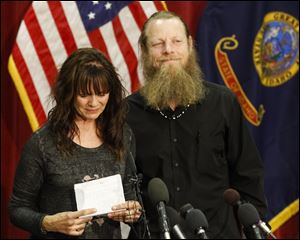 Jani and Bob Bergdahl speak to the media during a press conference at Gowen Field in Boise, Idaho, on Sunday. Bob Bergdahl, the father of an American soldier just released from captivity in Afghanistan says he's proud of how far his son, Sgt. Bowe Bergdahl, was willing to go to help the Afghan people.