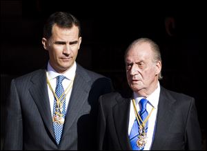 Spain's King Juan Carlos, right, and Crown Prince Felipe, left, in December, 2011.