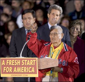 In this Oct. 26, 2004 file photo, Navajo Code Talker Chester Nez blesses the crowd at an outdoor rally at Civic Plaza in Albuquerque before a speech by Democratic presidential candidate Sen. John Kerry.