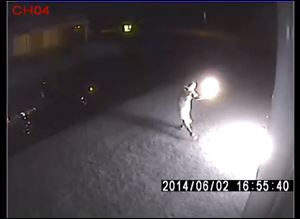 Screen grab of attempted arson at Masonic Temple.