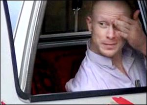 Sgt. Bowe Bergdahl, sits in a vehicle guarded by the Taliban in eastern Afghanistan prior to his release Saturday.