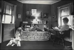Beth and Frank Luchsinger in their third-floor bedroom of the windmill house in Bowling Green in June, 1977.