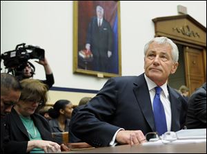Defense Secretary Chuck Hagel arrives on Capitol Hill in Washington to testify before the House Armed Services Committee.  