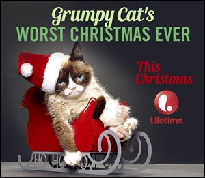 Grumpy Cat in a promotion for 'Worst Christmas Ever.'
