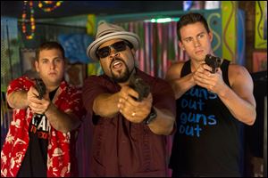 From left: Jonah Hill, Ice Cube, and Channing Tatum in a scene from the movie.