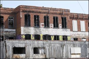 This building is along Central Avenue across from Albion and alongside the railroad tracks. Councilman Jack Ford says the city’s blight problem is from lax enforcement, not the inevitable result of population loss. 