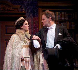 Eliza Doolittle (Natalie Ballenger) and Henry Higgins (Ted Christopher) get set to step out in the Ohio Light Opera production of ‘‍My Fair Lady.’