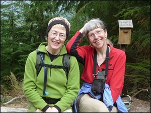 Missing hiker Karen Sykes, right, with her friend Lola Kemp. Crews are searching Mount Rainier National Park for Sykes, a prominent hiker and outdoors writer who was reported missing late Wednesday.