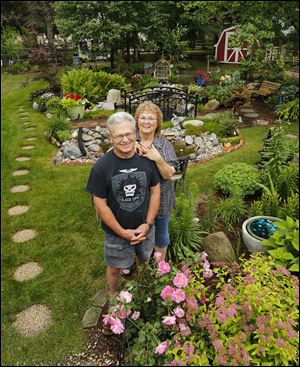 Ken and Jeanie Lutz will display their garden at their Lambertville home during the Bedford Garden Club tour on July 18.