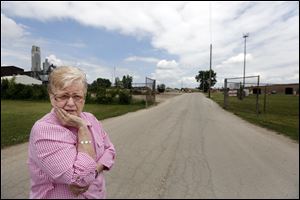 Donna Bernhard, Block Watch leader, represents some North Toledo residents who claim they are experiencing lingering effects from the massive fire the first weekend in May at Stickney Recycling’s landfill.