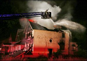 Fire at a home on Lincoln Avenue Thursday, June 26, 2014.