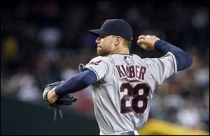 Cleveland Indians' Corey Kluber throws a pitch to the Arizona Diamondbacks during the first inning of a baseball game Wednesday, June 25, 2014, in Phoenix. (AP Photo/Ross D. Franklin)