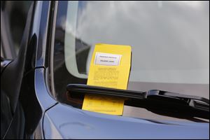 A ticket on a car parked on Superior Street near Madison means  the driver has to pay up or face a probe into prior fines.