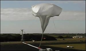 This image provided by NASA shows the launch of the high-altitude balloon carrying a saucer-shaped vehicle for NASA, to test technology that could be used to land on Mars, Saturday June 28, 2014 in Kauai, Hawaii. Saturday's experimental flight high in Earth's atmosphere is testing a giant parachute designed to deliver heavier spacecraft and eventually astronauts.