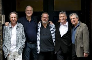 From left, Eric Idle, John Cleese, Terry Gilliam, Michael Palin and Terry Jones of the comedy group Monty Python during a press conference today in London.
