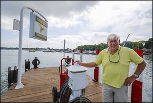 Marv Booker, owner of the Boardwalk Family of Restaurants, including The Keys, Hooligans, and Dairy Isle,  says sales have been down about 15 percent  this summer as dock construction continues.