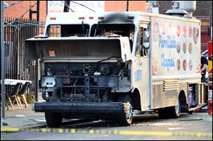 A propane tank on a food truck exploded in Philadelphia Tuesday, sending a huge fireball into the sky and injuring at least 11 people.