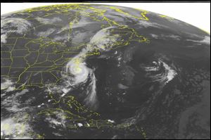 This NOAA satellite image shows Hurricane Arthur rolling across the Outer Banks of North Carolina, where hurricane conditions were reported early on the morning of the July 4th.