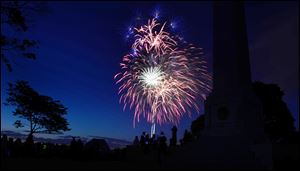 Patrons enjoy the fireworks display at the Star Spangled Banner celebration held at Fort Meigs in Perrysburg.