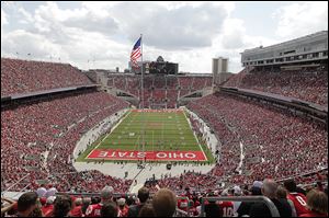 Ohio State plays against Florida A&M at Ohio Stadium in Columbus on Sept. 21, 2013. Ohio State was second in the nation last year in attendance with an average crowd of 104,933 and has since added 2,522 seats to the south stands in the Horseshoe.