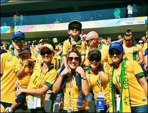 Ivi Casagrande, center, bonded with many families of the Australian men’s soccer team, including Matt McKay’s family.