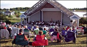 Festivalgoers enjoy the musical acts at the Maumee Bay State Park Ampitheater.