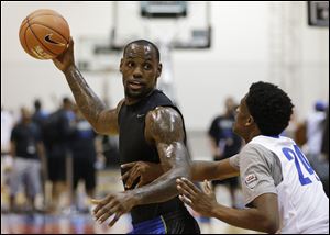 Lebron James plays basketball with high school students during the Lebron James Skills Academy Wednesday in Las Vegas.