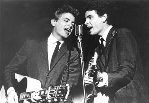 Don Everly and Phil Everly of The Everly Brothers during a 1964 performance.