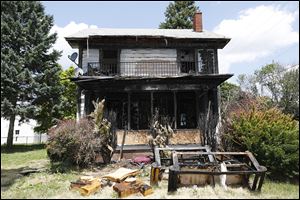  The fire at 921 Booth Ave. was one of 12 structure fires that took place over the July 4 weekend. Two have been ruled arsons so far, according to Toledo Fire Department spokesman Lt. Matthew Hertzfeld.