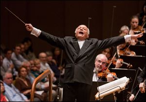 In this June 25, 2009 file photo released by the New York Philharmonic, Lorin Maazel conducts the orchestra at Avery Fisher Hall in New York. 