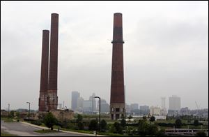 Smokestacks from the former Acme power plant will be imploded today.