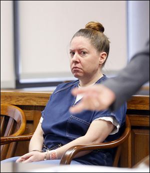 Lori Massingill, 39, of Ida, Mich., was found not guilty by reason of insanity of charges stemming from the deaths of her twin infants in a car crash.