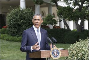 President Barack Obama makes a statement on the situation in Ukraine and Gaza, at the White House today in Washington.