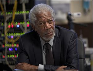 Morgan Freeman plays leading brain expert professor Norman in a scene from the movie.