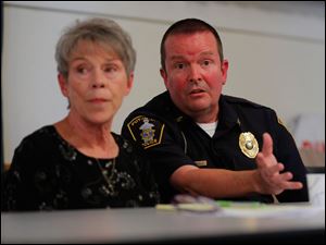 Put-In-Bay Mayor Margaret Scarpelli and Police Chief Rick Lampela at tonight's hearing.