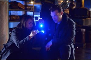 Mia Maestro as Nora Martinez and Corey Stoll as Ephraim Goodweather in a scene from ‘‍The Strain.’ 