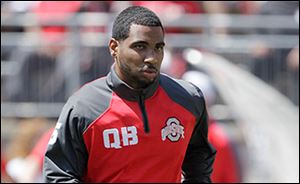 Ohio State quarterback Braxton Miller jogs before the start of their spring NCAA college football game Saturday, April 12, 2014, in Columbus, Ohio. 