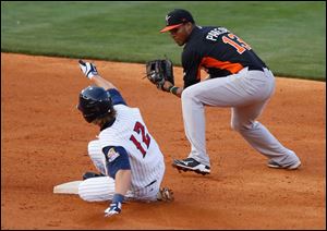 Toledo's Jordan Lennerton beats Norfolk's Jimmy Paredes' tag at second base to earn a double bottom of the third inning.