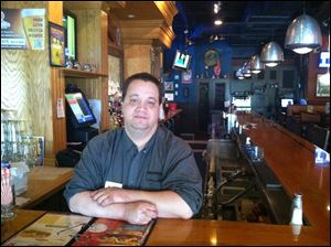 Daniel Taylor, general manager of Max & Erma’s at Levis Commons in Perrysburg, said he used his experience at rib-off events to open without tap water.
