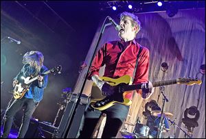 Bassist Rob Pope, left, and singer/guitarist Britt Daniel of Spoon perform as the band kicks off its tour at Brooklyn Bowl Las Vegas at The LINQ on June 26 in Las Vegas. 