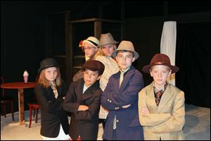 Elle Hurst, Tanner Strock, Carter Rodriguez, and Charlie Herrman, front row, and Alice Momany and Abbie Fricke, in back row, are among cast members in the Young Rep’s presentation of ‘‍Bugsy Malone, Jr.’ today through Sunday.