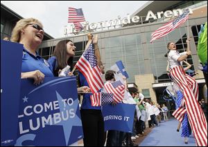 A crowd at Nationwide Arena welcomes a Democratic National Committee team.