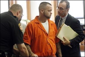 Denzil Wells II, 40, with his attorney Drew Griffith, pleaded guilty in the death of Nicole Sours, 37, who was found dead in his bed.