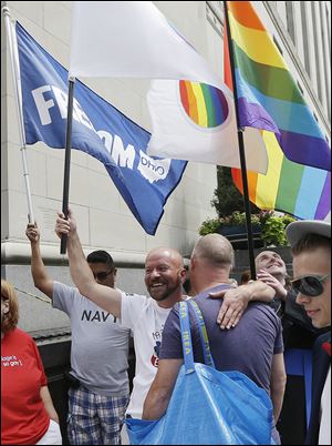 Gay-marriage supporters picket outside the 6th U.S. Circuit Court of Appeals on Wednesday in Cincinnati. 
