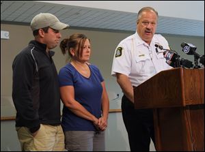 Monroe County Sheriff Dale Malone, with Tom and Christy Turner, parents of Hayley Turner, 18, during a news conference about Ms. Turner's disappearance.